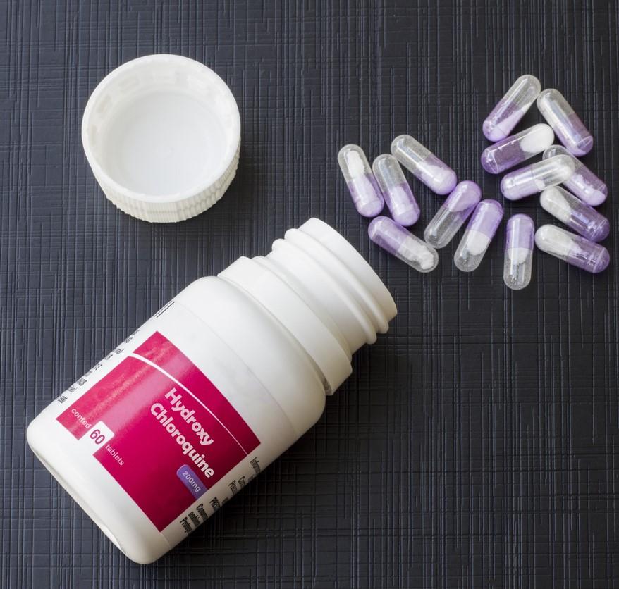 Hydroxychloroquine bottle and pills