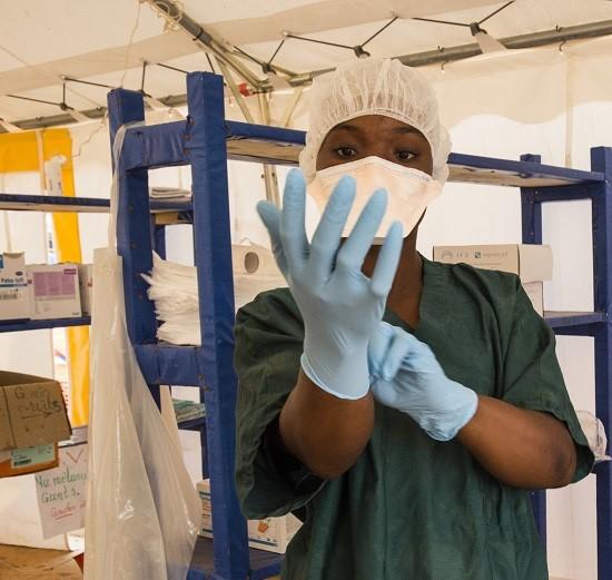 Ebola health worker in treatment center