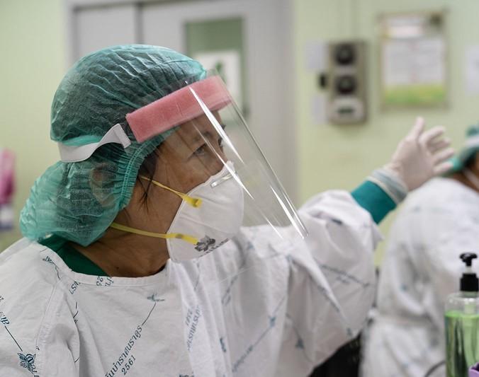 Health worker wearing personal protective equipment