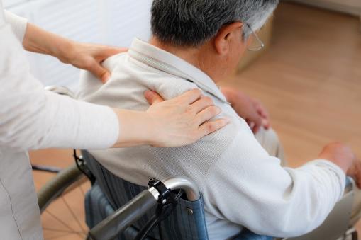 Home care of man in wheelchair