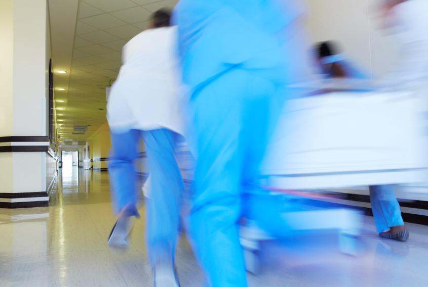 Hospital staff rushing patient