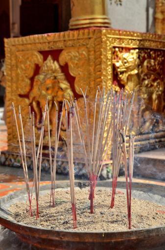 Incense sticks at Chinese graveside