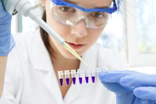 Lab worker loading PCR samples