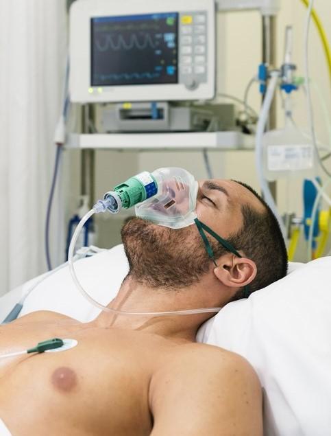 Male patient with oxygen mask