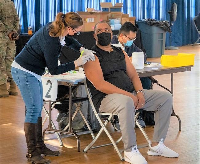Man getting the COVID vaccine
