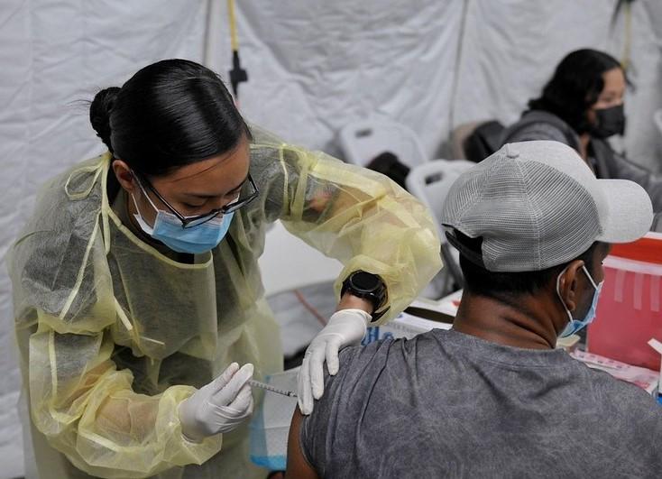 Man getting COVID-19 vaccine