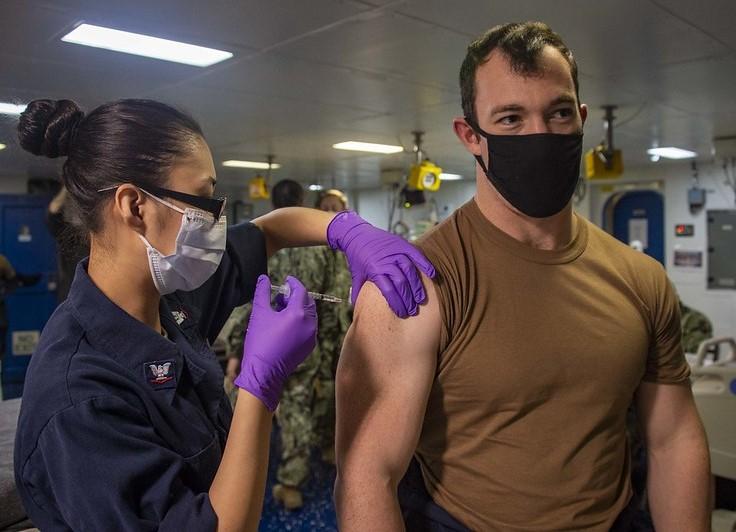 Man getting COVID vaccine