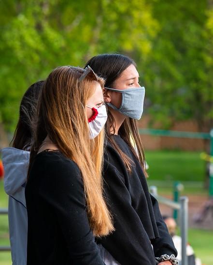 Women wearing face masks in a park