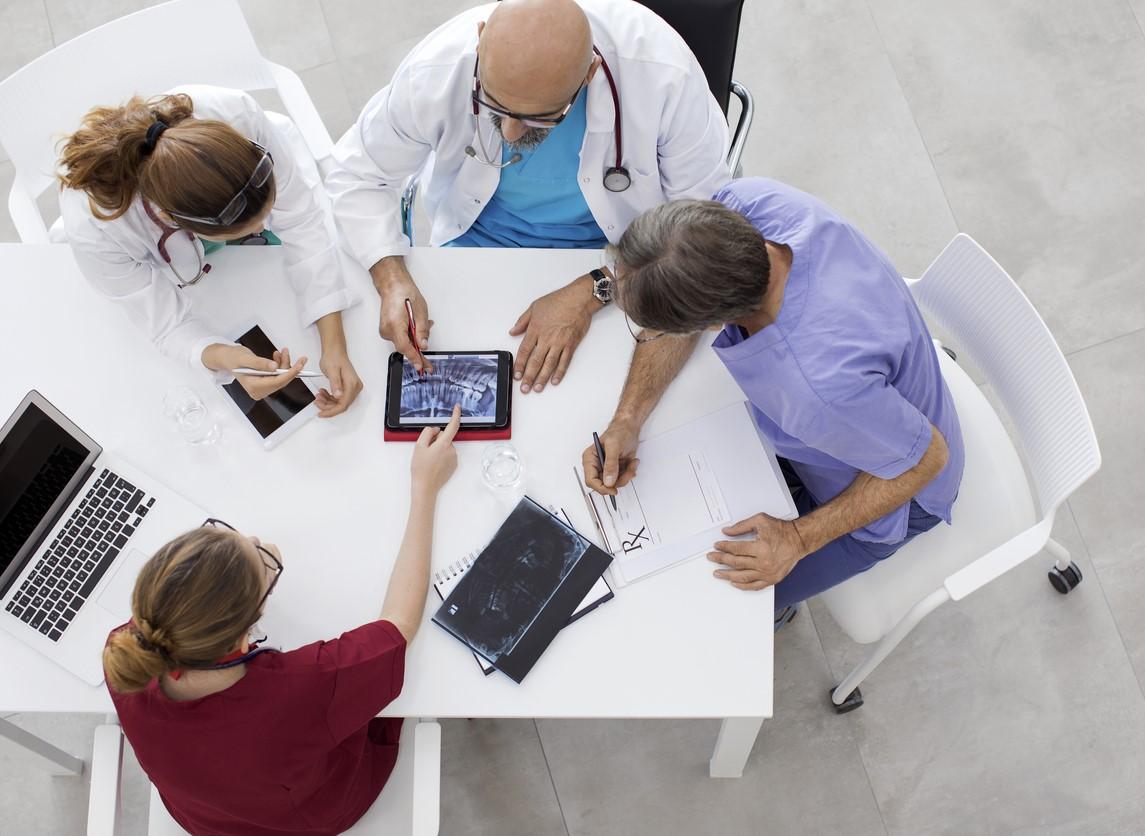 Medical team consultation aerial view