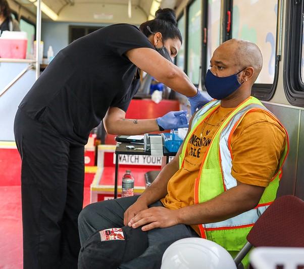 Man getting vaccine in mobile unit
