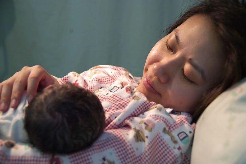 Mother holding newborn