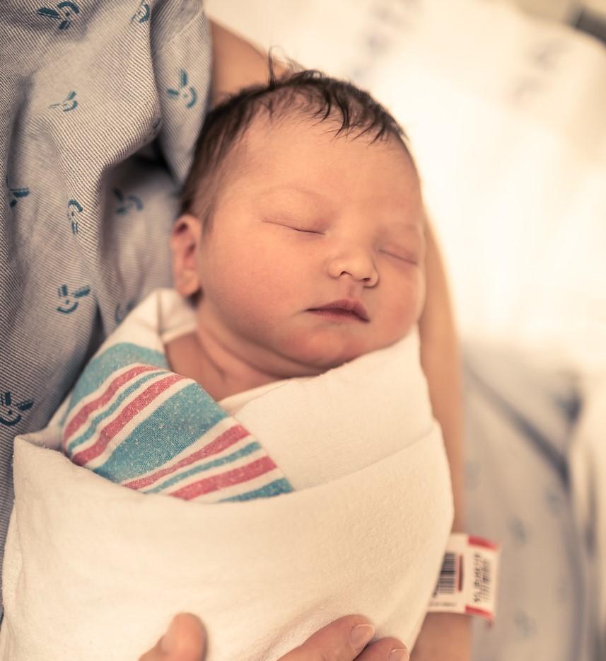 Mom holding newborn