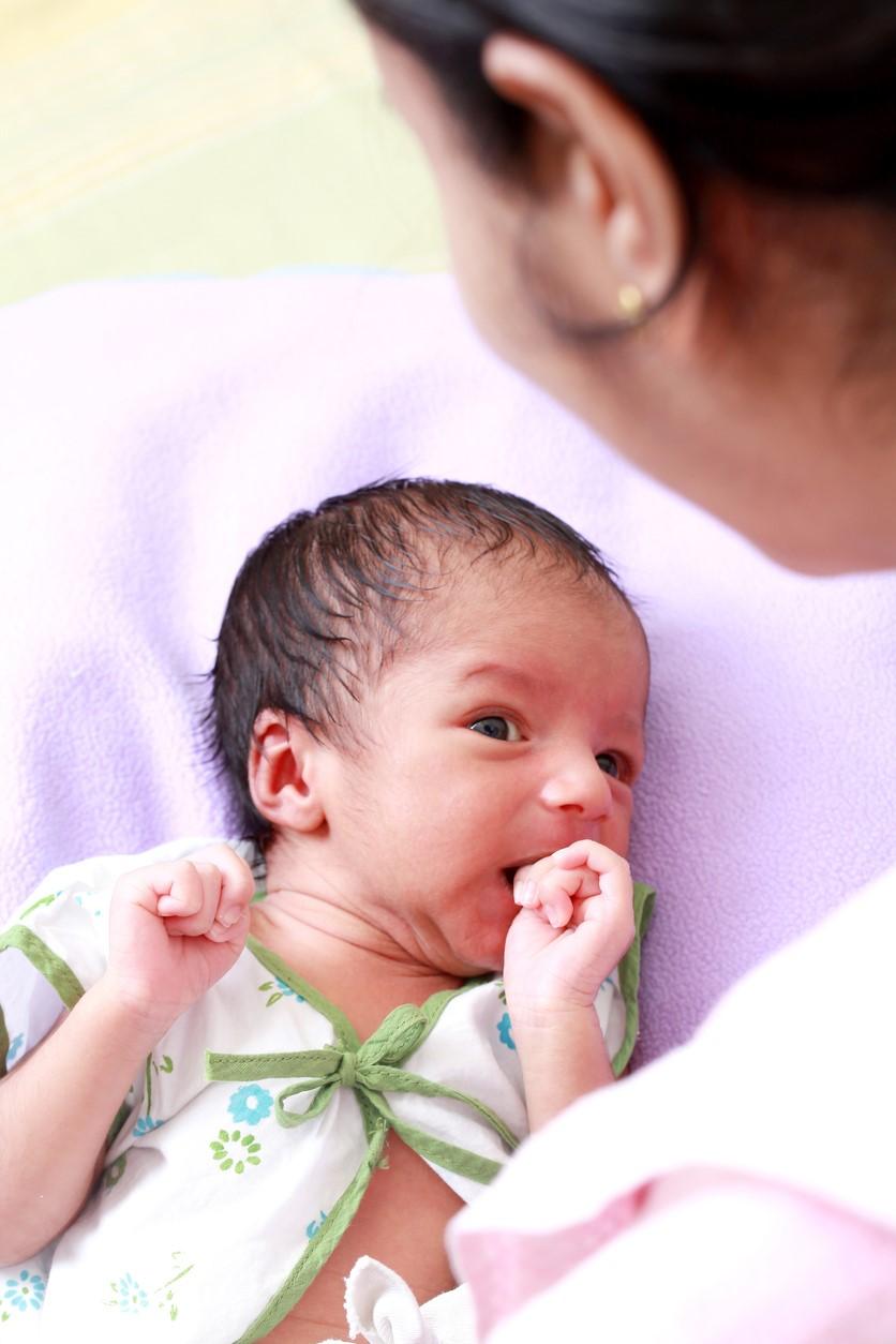 Mom tending to newborn