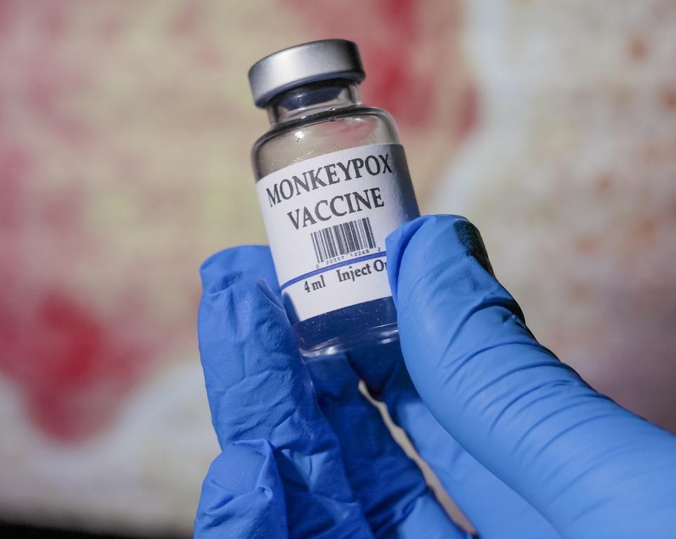 Monkeypox vaccine vial in gloved hand