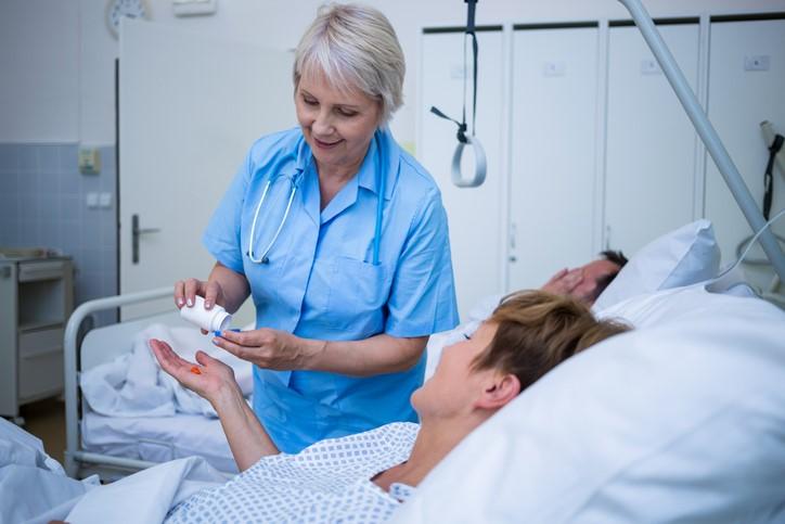 Nurse dispensing oral medication