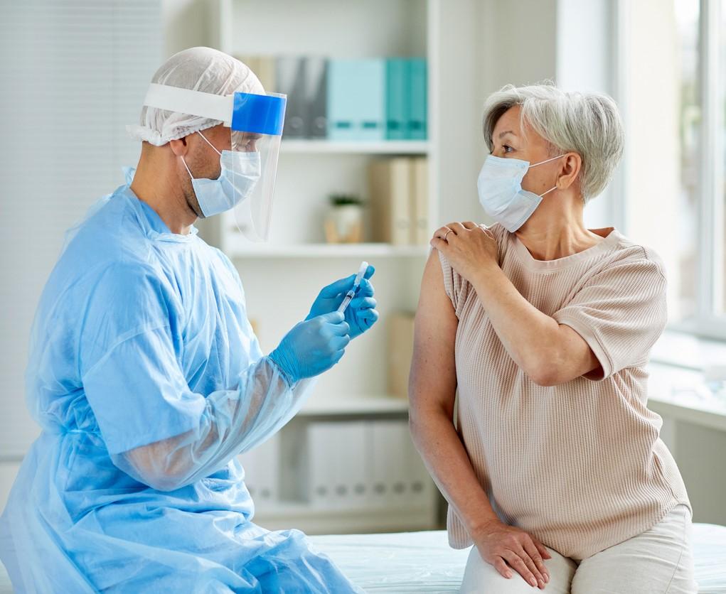 Nurse preparing to give vaccine