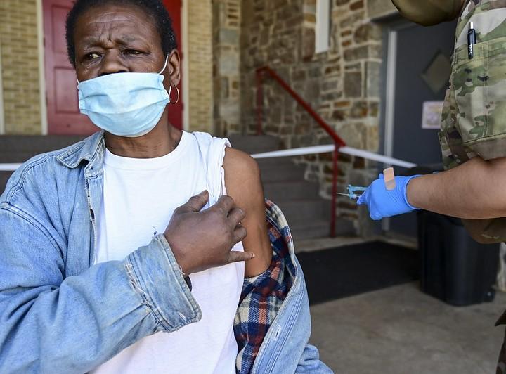 Older man getting COVID vaccine