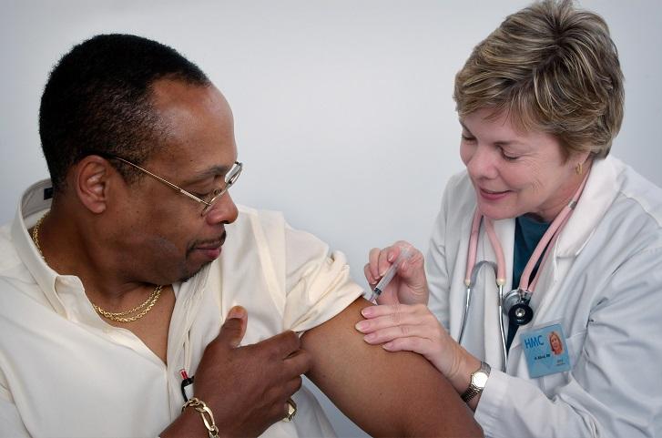 Older man getting vaccinated