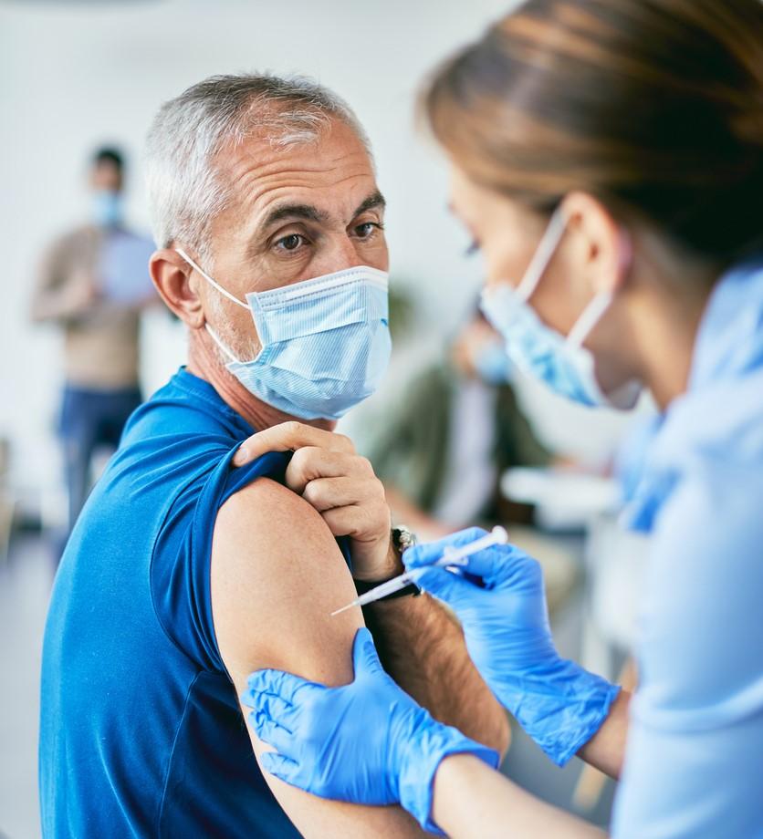 Older man getting vaccinated
