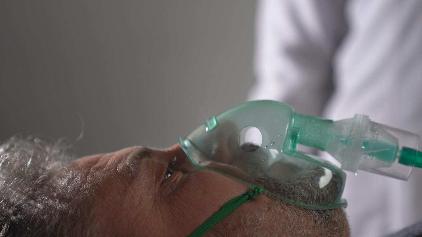 Older man with oxygen mask