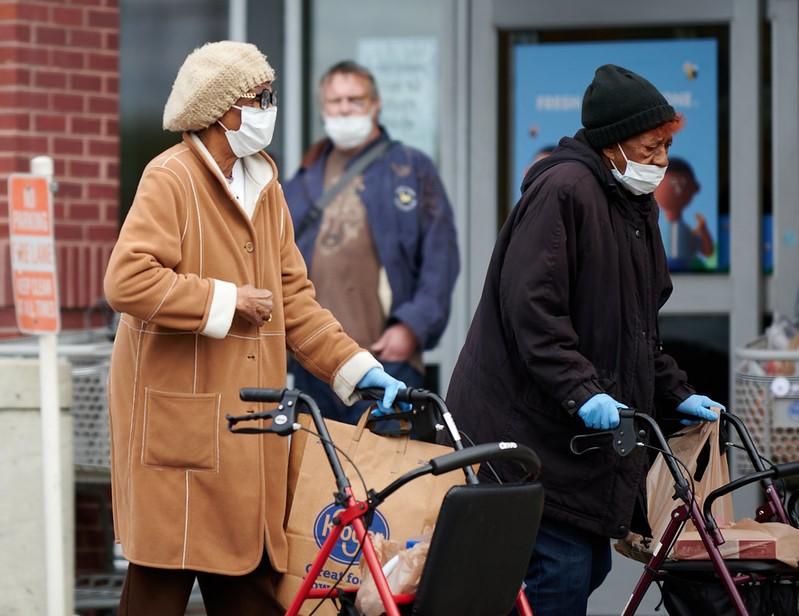 Older people wearing masks