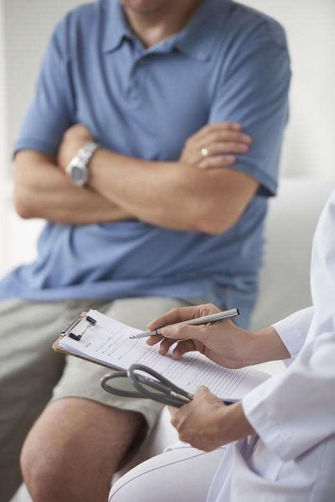 Patient and physician in doctor's office