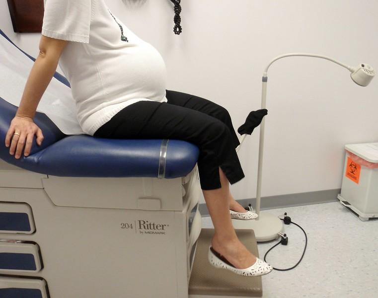 Pregnant woman in exam room