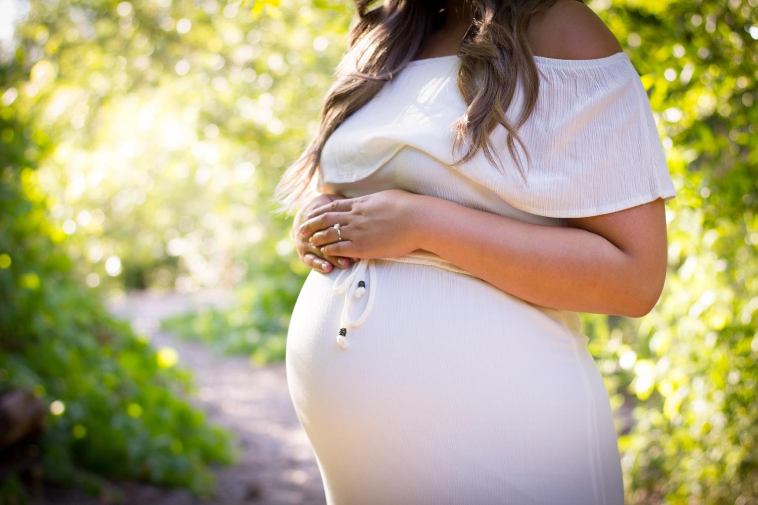 Pregnant woman in the summer