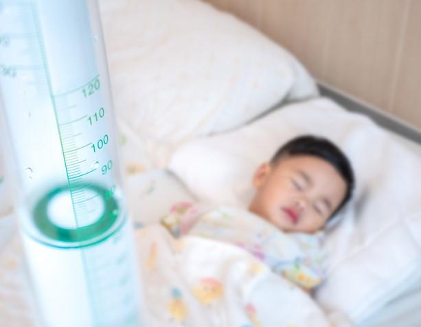 Sick Asian boy in hospital