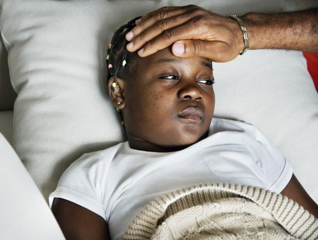 Sick girl in bed