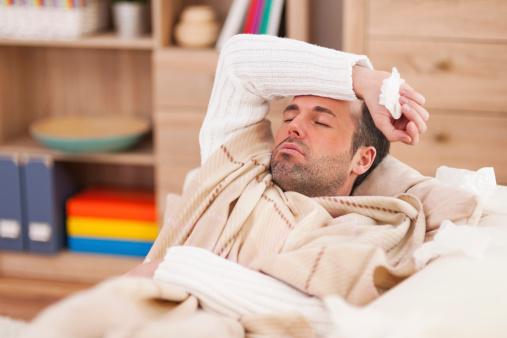 Sick man in bed