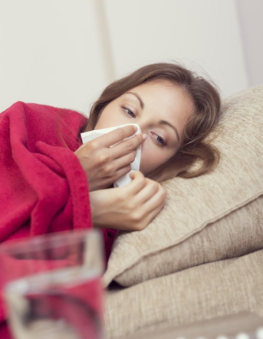 Sick woman on bed