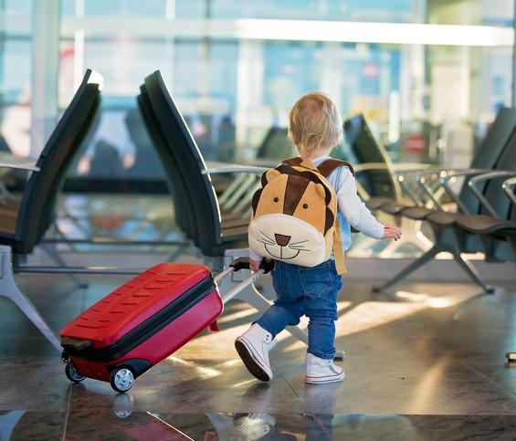 Small child walking in airport
