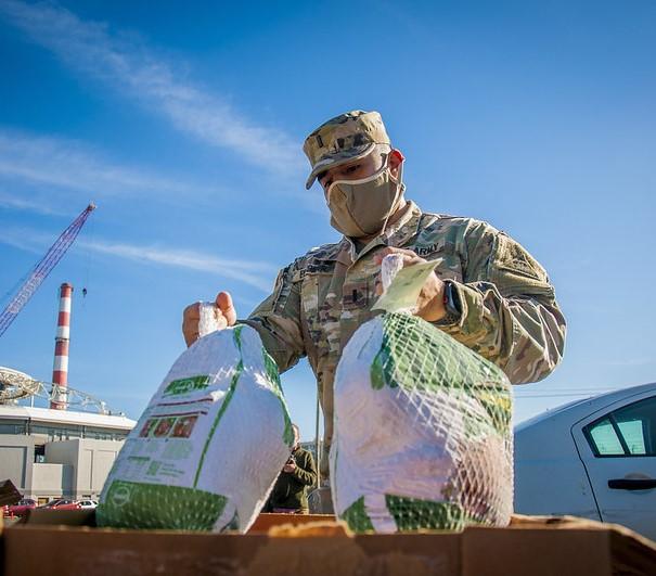 Soldier with frozen turkeys