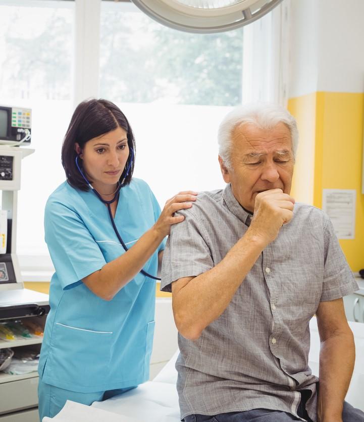 Stethoscope exam on coughing patient