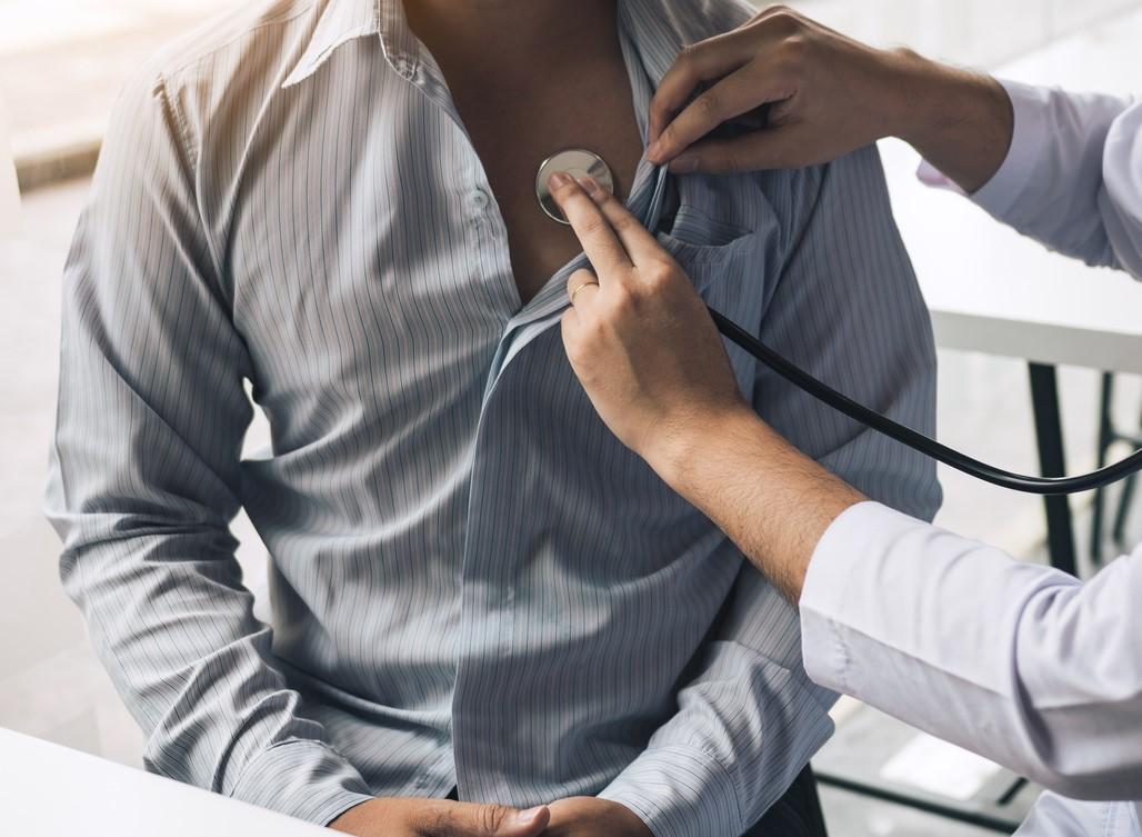 Stethoscope on man's chest
