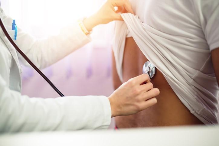 Stethoscope on patient's back