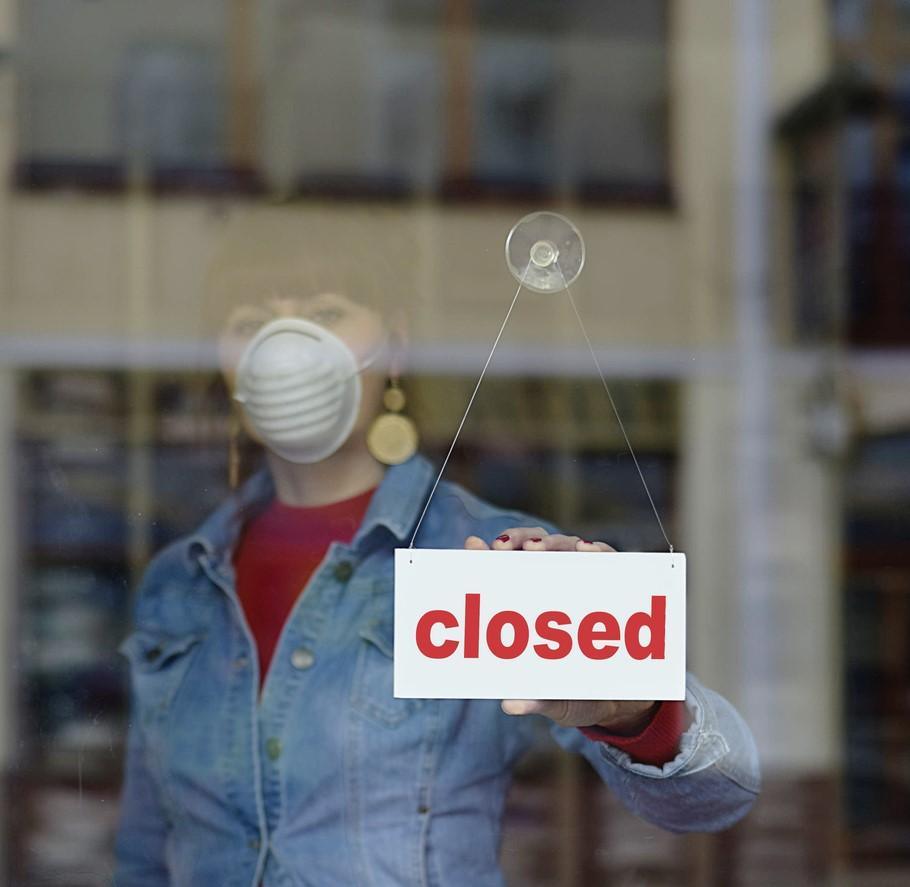 Store with closed sign