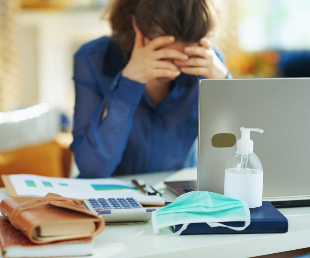 Stressed woman at computer