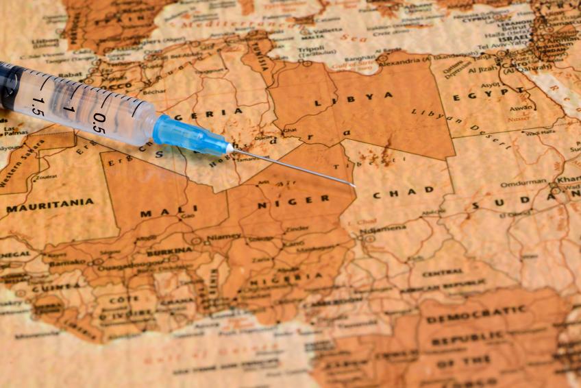 Syringe on map of West Africa