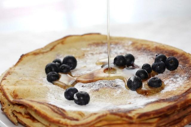 Syrup on blueberry pancakes