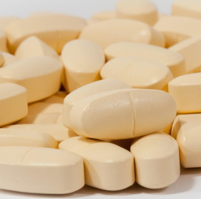 Tan drug capsules