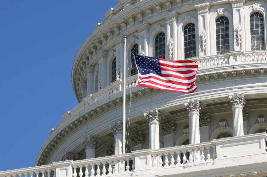 US Capitol with flag