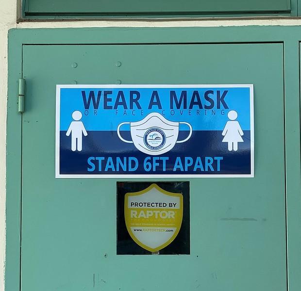 "Wear a mask" sign