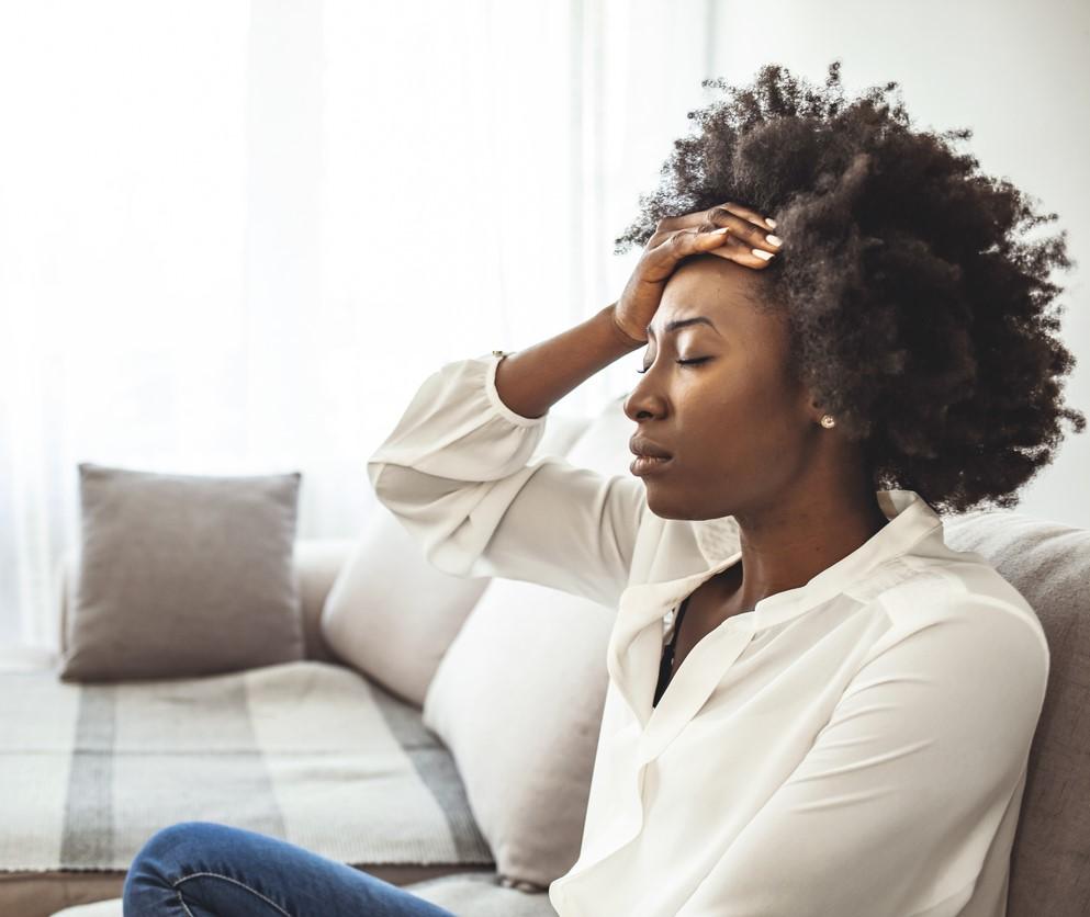 Young woman with headache