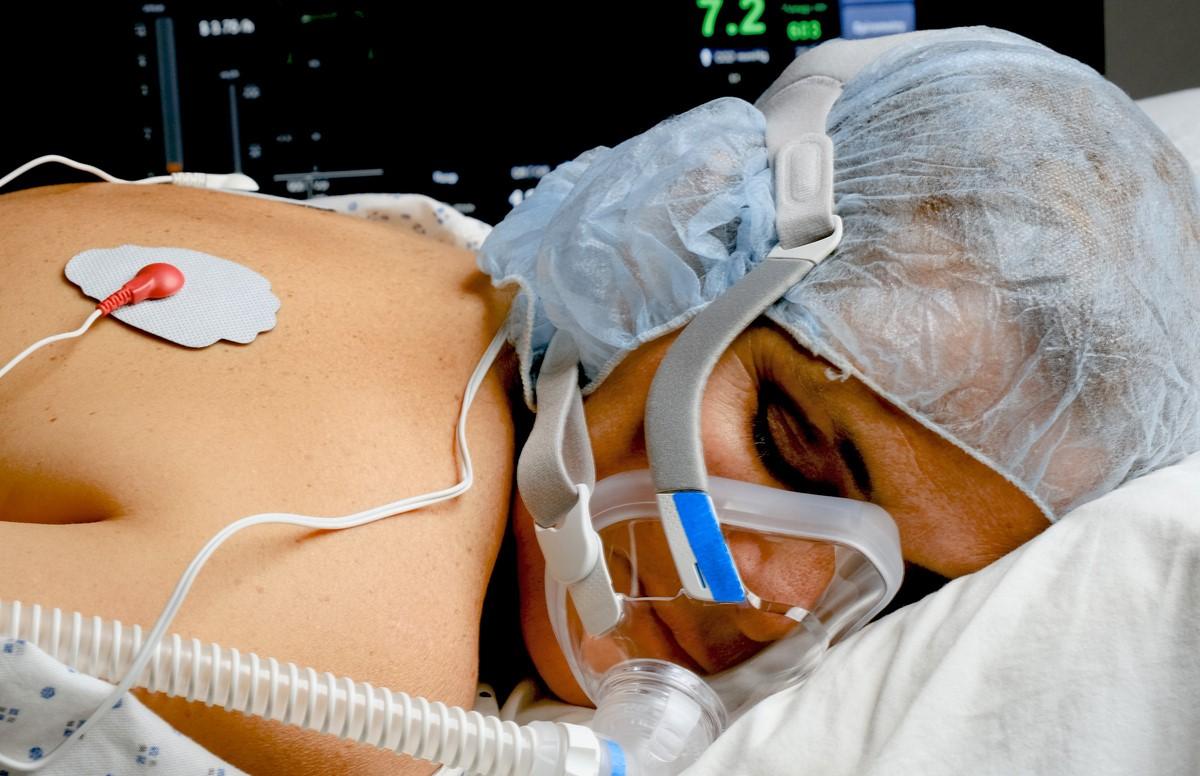 Woman on oxygen in prone position