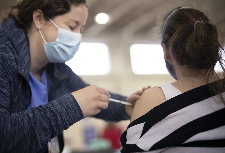 Woman receiving COVID vaccine in Pennsylvania