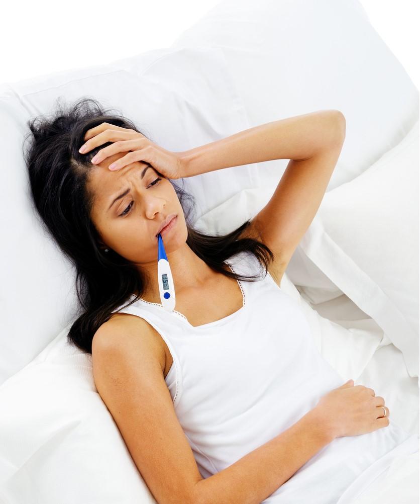 Woman sick in bed