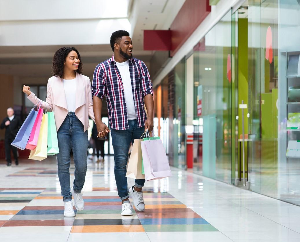 Young couple shopping in mall