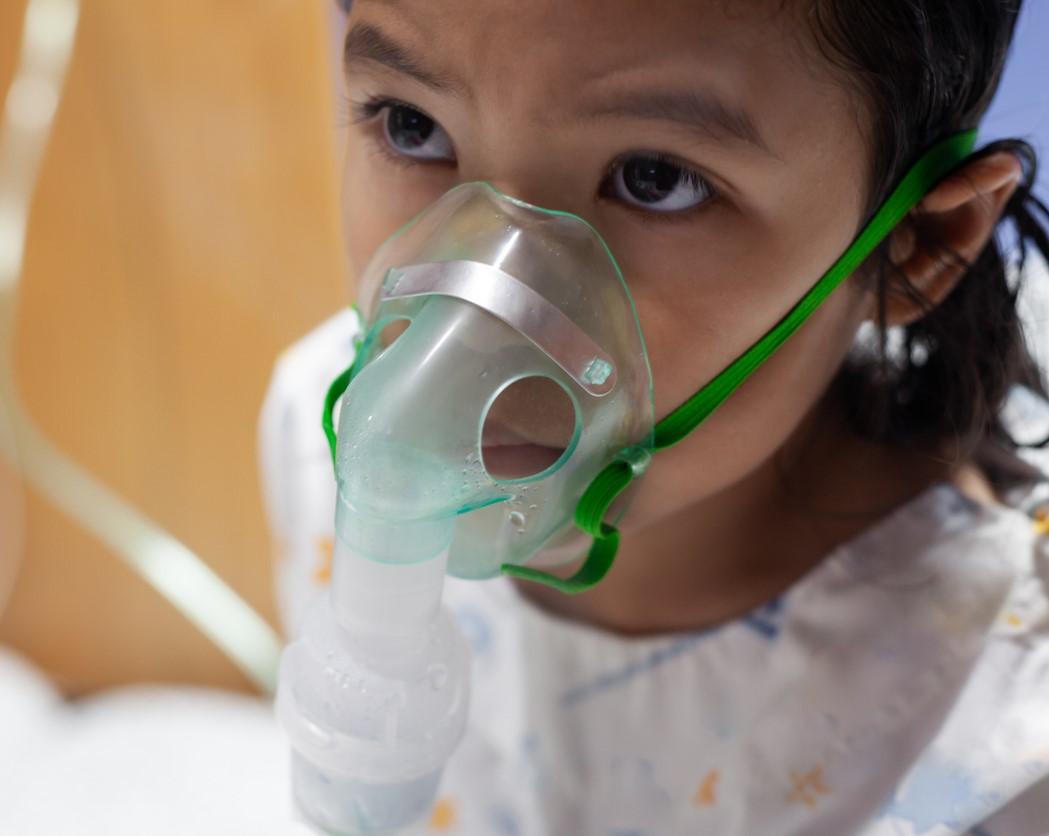 Young girl on nebulizer